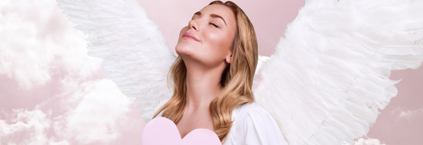 image of beautiful angel woman holding heart