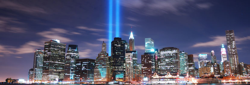image of new york city with a beaming light coming from the world trade centre memorial