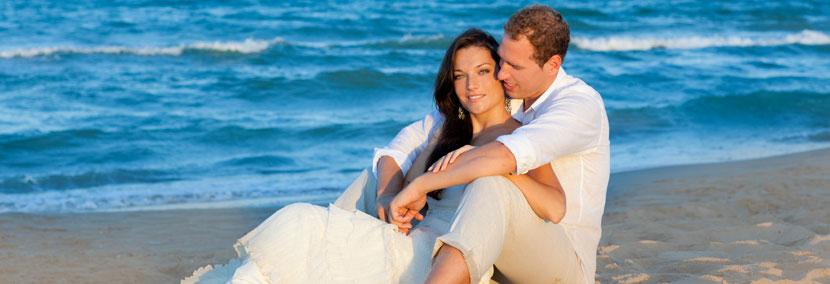 image of couple relaxing and in love on the beach