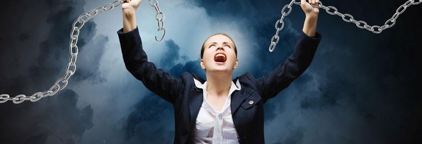 image of woman breaking free from chains