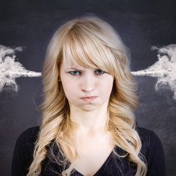 image of angry woman with steam coming out of ears