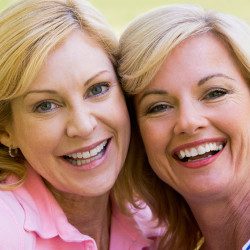 image of two women friends hugging