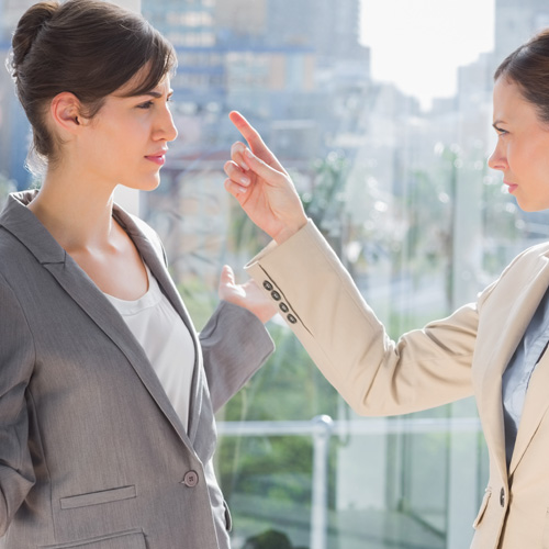 two businesswomen at work having an argument
