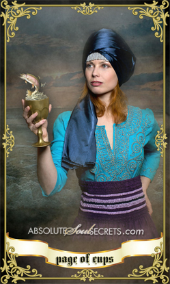 image of woman holding a goblet with a fish representing the Page of Cups tarot