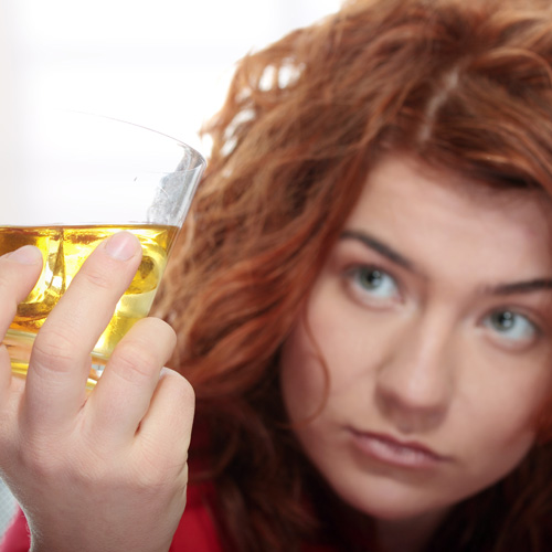 image of a woman struggling with alcohol