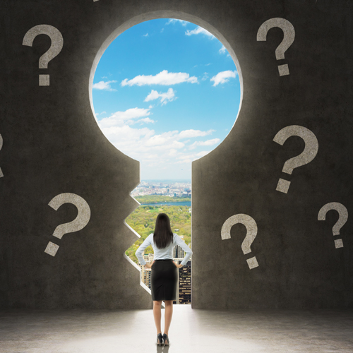 image of woman looking through a door of opportunity surrounded by question marks