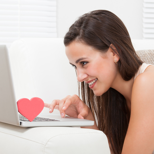 image of a woman talking on the internet with her long distant partner