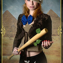 Image of Woman with a bat with pyramid behind her