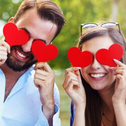 image of couple with love hearts over their eyes