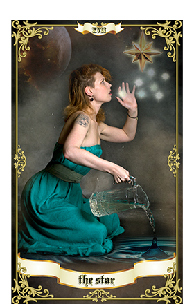a woman in a green dress looking up at the star making a wish