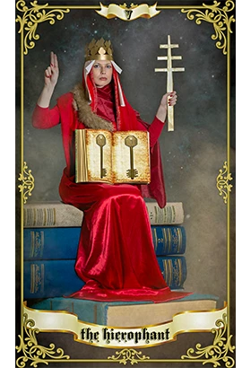 The Hierophant tarot card showing a robed spiritual figure holding sacred symbols, representing tradition, guidance, higher wisdom and spiritual authority.